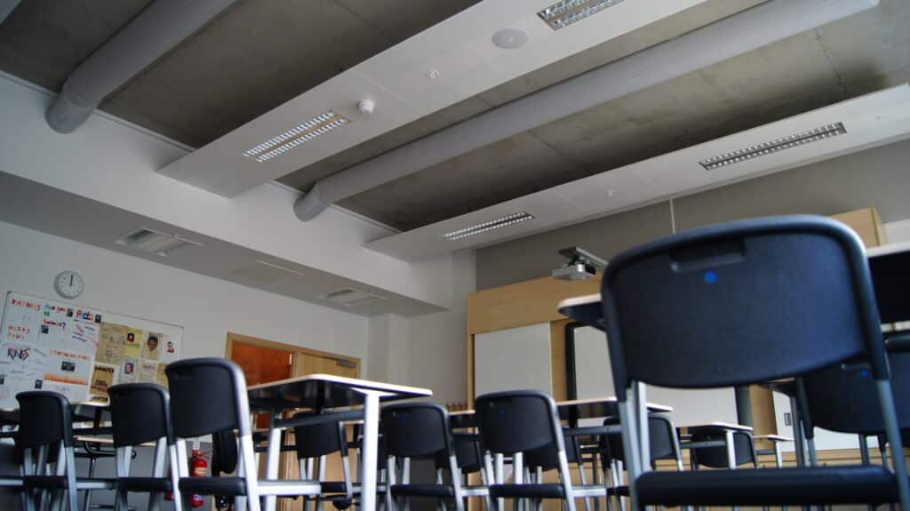 view of classroom ceiling mounted air sock ventilation