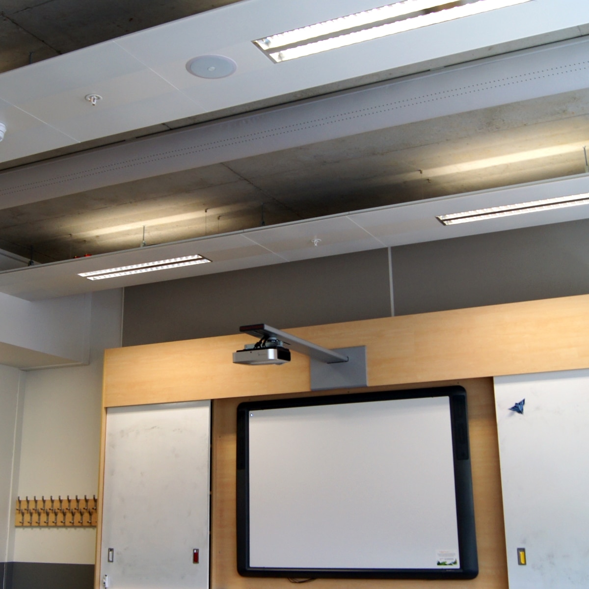 Half round fabric diffusers in a classroom