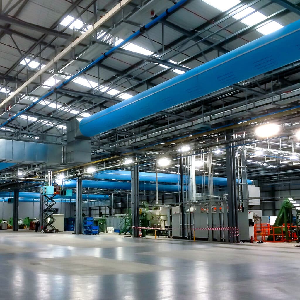 Blue Prihoda fabric ducts installed in a factory