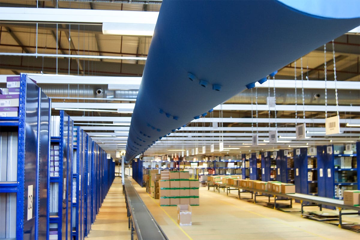 Industrial fabric duct with nozzles