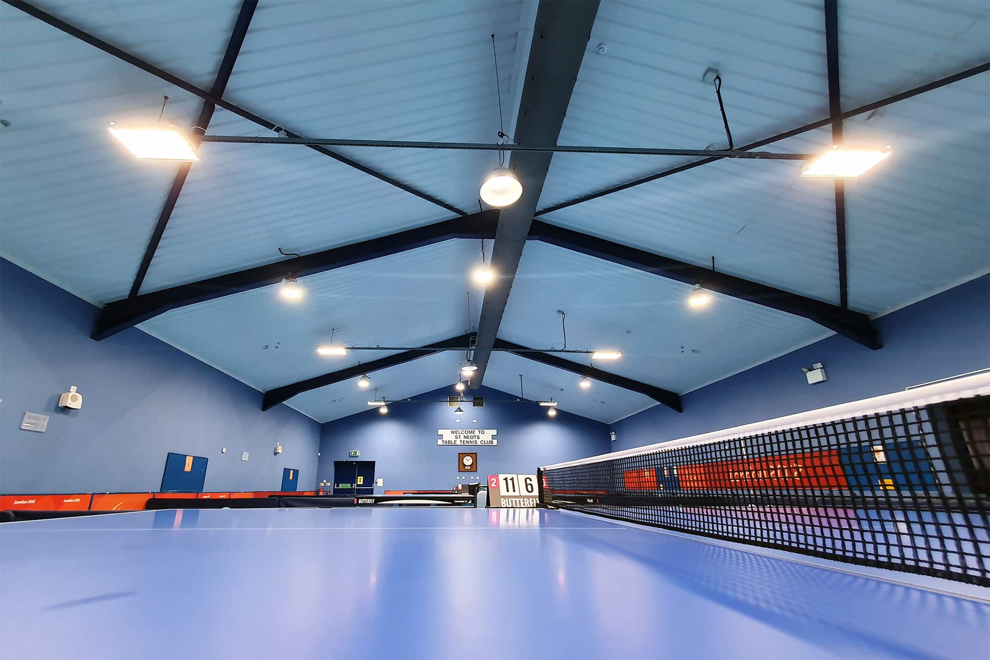 Grey fabric duct in a table tennis hall